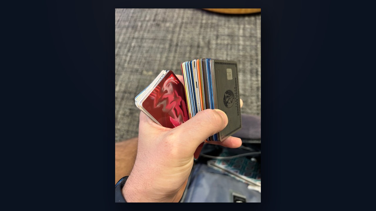 A stack of real US business credit cards held by a non-resident founder